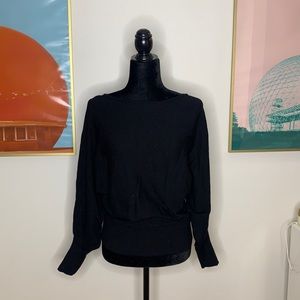 Puffy sleeves. Large neckline